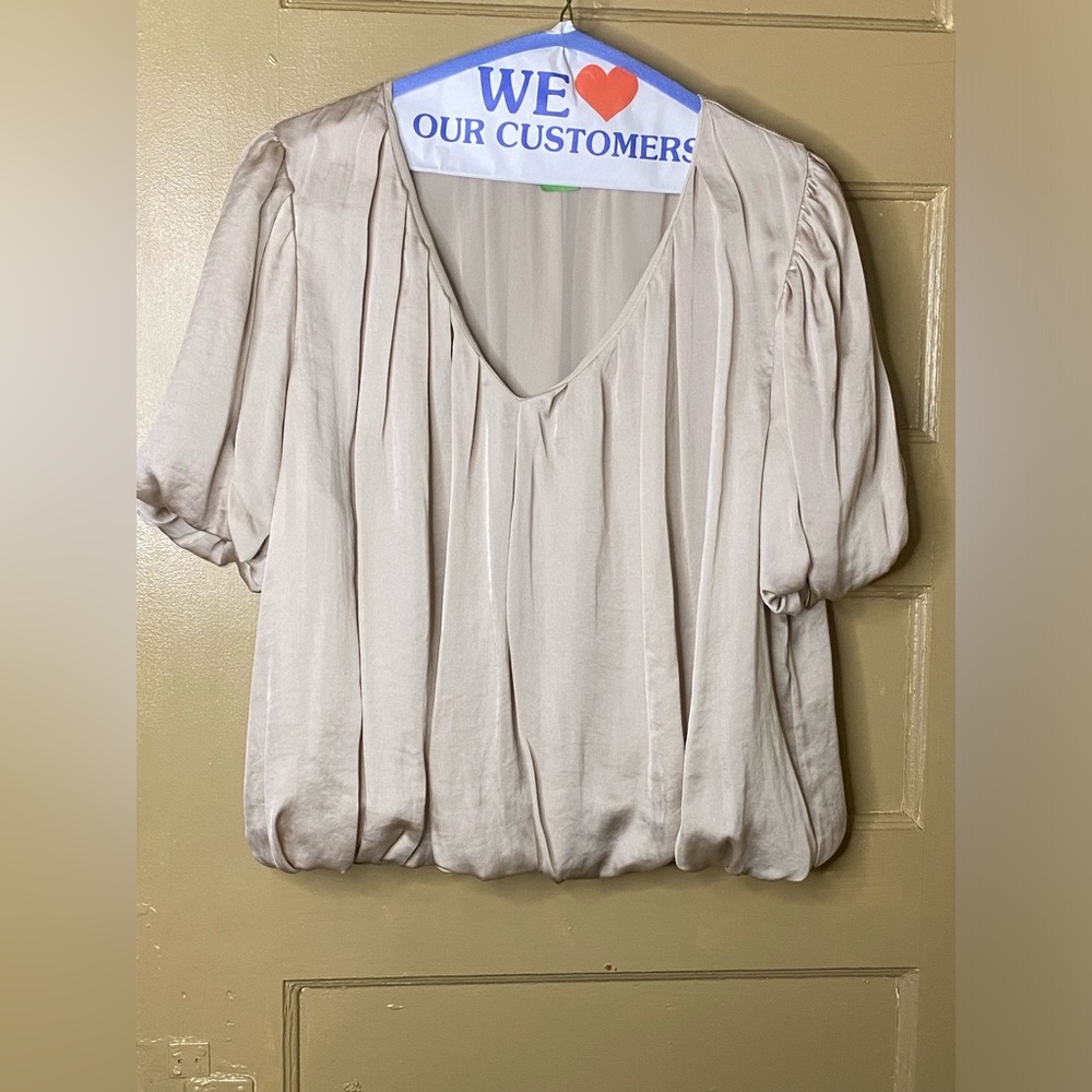 NWOT Astr blouse In champagne color. Size Large.